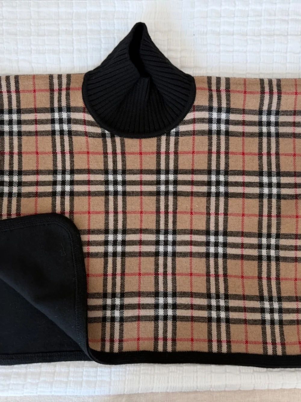 Reversible Burberry coat.